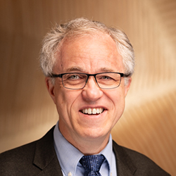 Portrait of Randall Q. Snurr smiling at the camera